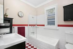  10 Carrington Street Bowral NSW 2576 $1,175,000 This original (circa 1950’s) cottage has undergone a sympathetic renovation that has enhanced the property without losing any of its original charm. A most striking street appeal featuring dark weatherboards, a sandstone pathway and established plantings (all behind a white picket fence) will be an absolute favourite for those seeking a Southern Highlands weekender or those “right sizing”. Located on the edge of town with a level walk to shops, restaurants and medical facilities this property is position perfect - we would love to show you through! Features include: Gas central heating Reverse-cycle split-system air conditioning Slow-combustion wood fire Gas bayonets Large freestanding garage Outdoor entertaining deck  Master suite with built-in wardrobes Bay windows and window seat Plantation shutters 9 foot ceiling height Timber floorboards 