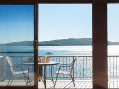  2/107 Soldiers Point Road Soldiers Point NSW 2317  $690,000 A family holiday is a much anticipated event that builds memories to last a lifetime, this water front townhouse at Kangaroo Point Reserve more than sets the perfect scene. You'd be nuts not to want to live here or use it as your holiday home as it is bright and airy, well maintained and presented. The design is creative with cathedral ceilings to the upper level exuding the feeling of space and light to the open plan living and dining that leads to the spacious balcony, whilst the kitchen is modern with plenty of space. On the lower floor is another living area that leads to the courtyard and water's edge. There's two generous bedrooms and laundry/bathroom. Covered parking for two cars gives easy access via direct entry to the foyer. Comes fully furnished if desired as well. This is a position perfect property situated within walking distance to numerous Bay beaches with their gentle waters action plus surf beaches just 10 minutes drive away. Soldiers Point boat ramp is just up the road as is another at Salamander Shores. A short hike of 450 metres and you are at Soldiers Point Bowling Club or just about the same to Bannisters Port Stephens, with more cafes and restaurants either West or South that are also very close by. Here's your chance to directly view the sparkling waters of Port Stephens and not have to look over rooves, it's a stunning view and the property is of generous size so come and secure it today, before this one slips through your fingers. Disclaimer:- Whist all care has been taken preparing this advertisement and the information contained herein has been obtained from sources we believe to be reliable, PRDnationwide does not warrant, represent or guarantee the accuracy, adequacy, or completeness of the information. PRDnationwide accepts no liability for any loss or damage (whether caused by negligence or not) resulting from reliance on this information, and potential purchasers should make their own investigations before purchasing. 