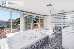  93 Bignell Street Illawong NSW 2234 $2,300,000 - $2,500,000 This Unique Luxurious 8 Bedroom 7Bathroom, Secure, Fully Ducted Home, Built on 1034M2 Land with four levels, Offers great Potential for a big family.  The Lower Ground Level: Has 2 Bedrooms with ensuites, walk in storage space and Spa in one, Laundry in the other, separate lounge, kitchen, with private entrance, potential for a Parents retreat, outdoor entertainment area, well designed swimming pool large deck with water views. The Ground Level : Has a Spacious open plan area, 2 balconies with water views, granite kitchen, 2 cook tops(gas & electric)combined oven, grill & microwave, dishwasher, pantry, ample cupboard space, breakfast island, dining, living room with hand beaten copper fire place, rumpus room, bar, cellar, bathroom and a separate formal lounge with see through pool and water views The Upper Ground Level: Has a large spacious 2 door garage, to fit 4 cars, space for pool or table tennis table, laundry, a detached bedroom with ensuite, (potential for an office or maids quarters)plus a drive way that can accommodate 4 to cars Upper top level : Spacious lounge, Balcony with water views Separate study, worship, storage area , 5 Bedrooms, Master bedroom has huge modern ensuite with spa, walk in Robe and beautiful water views . Other 4 bedrooms have built ins out of which one has an ensuite plus another common bathroom with spa, all this within close distance to bus, shopping and local cafes. 