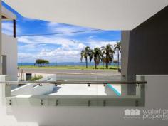  2 / 214 Hornibrook Esp, Woody Point -  Waterfront Properties Redcliffe Sea La Vie – SPECTACULAR BAYSIDE LIVING With brilliant , uninterrupted, beachfront vista featuring the Port of Brisbane, the Brisbane city and the gloriously illuminated bridge at night, your superb residence showcases ultimate in Bayside living. From the spacious courtyard securely protected behind high fences and gate, your new home is ideal for entertaining. Internally there are three large bedrooms, office and state of the art kitchen flowing through to the entertaining and outdoor patio presenting the world at your feet. The kitchen features luxurious, stunning granite benchtops, Two-Pac cupboards and soft closing drawers, quality Bosch appliances, air-conditioning and ceiling fans. The complex has a lift for easy portage of shopping from the two bay garage with double lock-up storage. Designed and built to the latest technological specifications including USB ports in all power points, category 6 cabling and Foxtel points to all rooms, NBN fibre optic to the apartment, video intercom service and crimsafe screens for added security. Your new apartment delivers spacious indoor and outdoor living, complimented by stylish fittings and finishes. Superbly located so that you can revel in the easily accessible water sports, endless waterfront parkland and pathways for walking, jogging or cycling and only three minutes to the local golf and bowls clubs - your long term health is assured when you make the move! Shopping, cafes, restaurants and public transport are a short stroll away. When you need to commute to Brisbane you are on the Bridge within a few minutes. Your ground floor apartment has an exclusive use rear courtyard coupled with a balcony to enjoy the joys of absolute beachfront living. All apartments in this boutique complex have 2 undercover, secure car spaces and double lock up storage units Call Mary today on 0438 054 227 to arrange a VIP inspection. 
