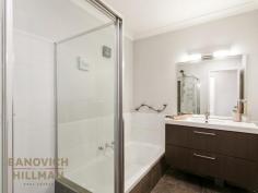  3/63 Park Street Como WA 6152 Located in a quiet street, this home is just a short stroll to both Coolgardie Reserve and Neil McDougall Park. With easy access to both Henley Street and Canning Highway this villa is ideally positioned for easy access to the Perth CBD and the Canning Bridge Train Station while also having convenient proximity to Curtin University, Penrhos and Wesley Colleges and Como Primary School. This spacious two-bedroom home has a sensible floor plan which features a large master bedroom with good sized wardrobes plus an additional second bedroom sizable enough to fit a double bed. The open plan living area is generous in size and there is a lounge room, dining and kitchen that have recently been renovated with timber floors, tasteful kitchen cabinetry, stone bench tops, built in wine rack and stainless-steel appliances. This opens onto the established outdoor gardens. New lighting ensures this area is light and bright at all times of the day or night. The bathroom has also been recently renovated and includes a bath with a separate toilet while the laundry tiling has also been upgraded. The grounds are reticulated and whilst easy care there is space for kids to play and pets to roam. There is undercover parking and rear storage shed. This generous home comprises 85sqm of building area and includes reverse cycle split system air-conditioning in the main living area and master bedroom. There is also a gas bayonet in the main living area for gas heating if preferred and the unit has been freshly painted throughout. A single level home of this size is rarely available within this highly sought after and convenient location. 