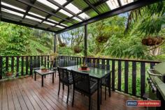  470 Mount Browne Road Upper Orara NSW 2450 $544,000 - $598,000 If you enjoy the sound of birds and the cool lush greenery of the rain forest surrounding, you will love this unique property. This charming residence with three bedrooms has plenty of character on near 12 acres of beautiful rainforest land with even an ocean view from the top of Mount Browne. The home is filled with unique design features that create a feeling of space and of bringing the outdoors in. The kitchen features ample cupboard space, stainless steel appliances and generous bench space to cook up a feast.There are three bedrooms and a bathroom, also wood fire heating that warms throughout the home and air conditioning for cooling in the summer. There is sweet, clear bore-water with good water pressure as well as tanks, all amidst the tropical rainforest setting. There is a separate self-contained cottage with two bedrooms, functional kitchen and very tidy bathroom with two large verandas also overlooking the view with vegetable beds and a chicken run nearby. Lots of extras like a large six-bay shed, all-weather road and driveway, fruit trees and more. Don't delay, this is a great opportunity to secure near 12 private acres close to town. An opportunity not to be missed. 