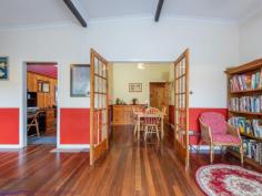  90 Scott Street Boya WA 6056 $449,000 Proudly displaying its mid-century credentials, this 1964-built home offers a sense of open, easy living with high ceilings, a flowing floorplan and a spectacular outlook to the enchanting Boya landscape. Sitting well back from the road, tall trees and a series of raised garden beds create a sense of privacy in a property that offers ample and an elevated rear deck with national park views and a below ground pool. 4 bedrooms 1 bathroom 1964-built bungalow Lounge library sunroom Formal & informal dining Beautiful timber floors Open-plan high/ceilings Elevated east facing deck Pool & garden sheds 2023 sqm adjoins reserve Schools, shops, NP views A broad gable roofline gives this home a sense of organic connection to its site and declares the aesthetic and floorplan that awaits behind the front door. A small front deck leads to the front door and into an expansive lounge/dining room. Jarrah floors glow against white walls and high ceilings with exposed beams emphasise the sense of light and space. Anchoring the lounge/dining room is a decorative, white painted fireplace with ornate mouldings, currently decommissioned, the present owners rely on reverse cycle air-conditioning for climate control. Double French doors open into a spacious timber-lined library, this flexible space could be adapted for use as a theatre room, home office or games/activity room. A separate kitchen is arranged at one end of the central living area and offers a freestanding oven, corner pantry and U-shaped bench. A large laundry adjoining the kitchen could be utilised as a larder or butler’s pantry. Further potential exists in the storage space accessible from the laundry. This light and spacious workspace opens to a small private courtyard. Arranged along the home’s eastern side is a large sunroom; a beautiful, elevated space and the perfect spot for whiling away a lazy afternoon, gazing out to the everchanging landscape of Greenmount National Park. If you prefer livelier pastimes, a wide sliding door opens the sunroom to the rear deck to create an indoor-outdoor entertaining zone with spectacular views. A large store room adjoins the laundry and opens to a small private courtyard. Two bedrooms are arranged off the sunroom, the larger features a walk-in robe and both enjoy views to the national park. All four of the bedrooms are a good size and share the family bathroom. Outdoors, paths lead to the below ground pool where a native landscape and views of the national park ensure privacy and a sense of floating in your private billabong. This sense of privacy is reinforced by the reserve adjoining the property’s rear boundary. There is much to love and much potential here; a mid-century home with multiple living areas, good-sized bedrooms and ample space to entertain. The 2023 sqm lot ensures privacy and a sense of space while the location puts good schools and the services and amenities of town within easy reach. 