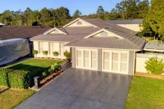  29 Atkinson Street Bellbird NSW 2325  $580,000 - $610,000 AS FAR AS GARAGES GO THEY DON’T BUILD THEM MUCH BIGGER! THE HOME – Family friendly home, four bedrooms all with built-in robes, three living areas & ensuite – Designer theatre room, perfect for teenagers or your own retreat for some peace, could be your 5th bedroom – Awesome outside entertainment area perfect for all seasons, 63m2 – fully sheltered – 5.5Kw solar system will keep the electricity bills under control THE GARAGE – 145m2- 17m x 8.5m – 4.8m height centre – See floor plan – internal wall & remote door split garage into 2 bays – perfect lock-up bay – 25m2 Mezzanine floor + electronic winch perfect for lifting heavy items – Five remote doors – great access – 3.3m door allows the biggest van, boat or machinery – Designated slab for a 21ft caravan, additional to separate garage – 1012m2 block, plenty of yard space Walk to Bellbird Primary, this is an ideal family property with loads of potential for a home business, storage, machinery you name it. It’s all yours! 