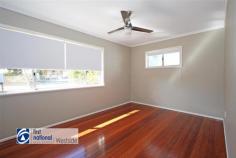  69 Bertha Street Goodna QLD 4300 $349,000 Magnificent home in the heart of Goodna I will make you the envy of all your friends of family after I have introduced you to your magnificent new home.  Stunning street frontage and a fabulous 900m2 block of land and the perfect house to match. At A Glance; Upper level Large double door entrance opening up to a large foyer Stunning polished timber steps leading upstairs to a large and spacious open plan family living, dining areas and kitchen The polished timber floors flow throughout the whole upper level and are simply stunning. The kitchen in enormous and its open plan design allows interaction with the family while prepping the evening feast. Modern and extremely stylish. Dining are plus an extra large breakfast bar allowing for several stools and more informal eating 3 spacious bedrooms with built in robes Front deck area where you can watch the world go by with wine in hand Downstairs Large foyer entry with double doors for the larger furniture pieces timber look vinyl plank through out the rumpus area and foyer 2nd bathroom downstairs Double garage with heaps of extra space for a workshop area Laundry off the rear of the garage Huge block with fabulous well established shrubs and trees. This home was beautifully renovated just a year or so ago and will make you proud to call it your home. There is very little you will need to do except add your furniture, your family and make it your own.  It really is a must see so make sure you add it to the top of your list. Viewings by appointment only so please call me today to organise your very own personal tour. Or alternatively come along to one of my open homes. Be quick to avoid disappointment. 
