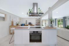  2 THE PARKWAY PLACE MAPLETON QLD 4560 $675,000 his freshly renovated, two storey home displays style and contemporary living with every element of the design being carefully thought out and executed, nothing left to do but move in and enjoy. The ground level is comprised of an open-plan living dining area, a luxurious kitchen with stone bench-tops, soft close cupboards and drawers throughout and under bench lighting; the living area flows seamlessly into the paved outdoor area, perfect for entertaining. The ground level also boasts a large Media room as well as laundry, Large Bathroom with Double shower, 4 car carport + a guest carport and an abundance of natural light. The contemporary design continues upstairs with an open and airy living area complete with a large bar/kitchenette; verandah access to downstairs and another stylish bathroom and four spacious bedrooms, 3 of which have access to a veranda, The attractive master bedroom is complete with a large Walk-in-robe and Ensuite. SPECIAL FEATURES INCLUDE:  - Four spacious bedrooms - Open-plan living - Rumpus/media room - Air-conditioning units to living and master - Master bedroom with ensuite - Walking Distance to Town and schools - LED lighting throughout  - Downstairs Kitchen & Upstairs Kitchenette/Bar - Under cover parking for 5 Cars  - No Pump out   -Two Water Tanks 