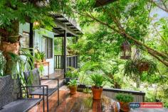  470 Mount Browne Road Upper Orara NSW 2450 $544,000 - $598,000 If you enjoy the sound of birds and the cool lush greenery of the rain forest surrounding, you will love this unique property. This charming residence with three bedrooms has plenty of character on near 12 acres of beautiful rainforest land with even an ocean view from the top of Mount Browne. The home is filled with unique design features that create a feeling of space and of bringing the outdoors in. The kitchen features ample cupboard space, stainless steel appliances and generous bench space to cook up a feast.There are three bedrooms and a bathroom, also wood fire heating that warms throughout the home and air conditioning for cooling in the summer. There is sweet, clear bore-water with good water pressure as well as tanks, all amidst the tropical rainforest setting. There is a separate self-contained cottage with two bedrooms, functional kitchen and very tidy bathroom with two large verandas also overlooking the view with vegetable beds and a chicken run nearby. Lots of extras like a large six-bay shed, all-weather road and driveway, fruit trees and more. Don't delay, this is a great opportunity to secure near 12 private acres close to town. An opportunity not to be missed. 