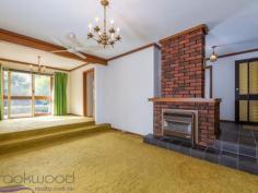  20 Innamincka Road Greenmount WA 6056 $319,000 Loved and cared for by the one owner for the last 48 years, this custom designed home, set on a big ¼-acre (1007sqm) block, boasts original elements and a functional floor plan to deliver a property with character and potential.  The comfortable brick and tile home features good sized bedrooms, a sunken lounge and a dining room with views across a patio to the big backyard. • Cherished 1 owner home • 2 bedrooms 1 bathroom • Spotless eat-in kitchen • Big sunken lounge room • Fabulous orig features • Good-sized bedrooms • Large family bathroom • Carport & garden shed • Mostly level 1007m blk • Cls to popular schools This cherished and happy 2 bedroom, 1 bathroom home has been maintained in immaculate condition by one owner. Original features bring charm and character, while a well-considered floorplan makes for comfortable, modern living. The ¼-acre lot, big backyard and super-convenient location – within easy reach of the services and amenities of town and the outdoor beauty of the Perth Hills – make for a home rich with possibilities and an attractive option for all buyers. A magnificent gum tree standing sentinel at the entry is your first hint of the generosity and welcome that imbues this property. A wide porch and tiled entry hall lead to a sunken loungeroom and dining area. A big picture window in the lounge area looks out to a green screen of an established garden. In the dining area, a sliding door opens to an elevated patio to create an indoor-outdoor entertaining area overlooking the expansive backyard. Reverse cycle air-conditioning and a northerly aspect bring year-round comfort to this flexible, open-plan living space with warm timber architraves and fresh, white walls. Adjoining the dining area is the original kitchen – impressive 70’s lino and the tiled splashback offer authentic style underlined by ample original cabinetry and a freestanding oven. A practical well-designed space, the kitchen is large enough to accommodate a breakfast table. Two good-sized bedrooms, the larger with a wall of built-in robes and a ceiling fan, share a large family bathroom with shower, Roman bath, vanity and W.C. The walk-through laundry opens to the paved carport on the home’s eastern side and an expansive backyard with a carob tree, pomegranate, frangipani and garden shed surrounded by a lawn and easy-care gardens filled with the sound of birdsong. This little gem is ready for new custodians and represents a fantastic framework on which to build your dreams. Its proximity to schools, services and amenities ensure its appeal now and into the future. Embrace the unmistakable charm of its 1970’s origins or take advantage of the ¼-acre lot and desirable foothills address to fashion your very own version of a happy home. 