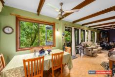  470 Mount Browne Road Upper Orara NSW 2450 $544,000 - $598,000 If you enjoy the sound of birds and the cool lush greenery of the rain forest surrounding, you will love this unique property. This charming residence with three bedrooms has plenty of character on near 12 acres of beautiful rainforest land with even an ocean view from the top of Mount Browne. The home is filled with unique design features that create a feeling of space and of bringing the outdoors in. The kitchen features ample cupboard space, stainless steel appliances and generous bench space to cook up a feast.There are three bedrooms and a bathroom, also wood fire heating that warms throughout the home and air conditioning for cooling in the summer. There is sweet, clear bore-water with good water pressure as well as tanks, all amidst the tropical rainforest setting. There is a separate self-contained cottage with two bedrooms, functional kitchen and very tidy bathroom with two large verandas also overlooking the view with vegetable beds and a chicken run nearby. Lots of extras like a large six-bay shed, all-weather road and driveway, fruit trees and more. Don't delay, this is a great opportunity to secure near 12 private acres close to town. An opportunity not to be missed. 