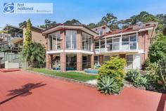 93 Bignell Street Illawong NSW 2234 $2,300,000 - $2,500,000 This Unique Luxurious 8 Bedroom 7Bathroom, Secure, Fully Ducted Home, Built on 1034M2 Land with four levels, Offers great Potential for a big family.  The Lower Ground Level: Has 2 Bedrooms with ensuites, walk in storage space and Spa in one, Laundry in the other, separate lounge, kitchen, with private entrance, potential for a Parents retreat, outdoor entertainment area, well designed swimming pool large deck with water views. The Ground Level : Has a Spacious open plan area, 2 balconies with water views, granite kitchen, 2 cook tops(gas & electric)combined oven, grill & microwave, dishwasher, pantry, ample cupboard space, breakfast island, dining, living room with hand beaten copper fire place, rumpus room, bar, cellar, bathroom and a separate formal lounge with see through pool and water views The Upper Ground Level: Has a large spacious 2 door garage, to fit 4 cars, space for pool or table tennis table, laundry, a detached bedroom with ensuite, (potential for an office or maids quarters)plus a drive way that can accommodate 4 to cars Upper top level : Spacious lounge, Balcony with water views Separate study, worship, storage area , 5 Bedrooms, Master bedroom has huge modern ensuite with spa, walk in Robe and beautiful water views . Other 4 bedrooms have built ins out of which one has an ensuite plus another common bathroom with spa, all this within close distance to bus, shopping and local cafes. 