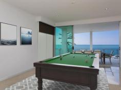  115 Margate Pde, Margate -  Waterfront Properties Redcliffe ULTIMATE IN LUXURY LIVING This luxurious masterpiece will impress from start to finish. Boasting the perfect location, this architecturally designed and built home offers outstanding vistas and a waterfront lifestyle second to none. Properties of this calibre and location are rarely offered to the market. Move in and enjoy being surrounded by the absolute quality this immaculate residence offers…… not to mention waking to the sound of waves rolling gently onto the foreshore, sunrise peeping over the horizon and the moon shimmering across the bay at the close of play …….. just amazing. The user-friendly design features high ceilings and spacious light filled rooms with a floor plan that spans 3 levels of designer brilliance, this home ticks every box. Providing the ultimate in executive entertainment with a full wet bar and pool room flowing onto the extensive deck, where you will spend hours enjoying the endless views across the bay or alternatively, move to the sanctuary of the media room to choose from a full range of entertainment options. The huge feature packed gourmet kitchen leaves nothing to be desired. Including a massive island bench ideally positioned to take in the glorious bay views. Miele appliances including dishwasher, 900mm induction cook top, steam oven, plate warmer and microwave with an abundance of storage. The third level master bedroom epitomises luxury with extensive bay vista pouring into the room, massive open area ensuite and WIR. A further three double sized bedrooms, all with large WIRs, a second ensuite, main 2 way bathroom/ensuite and powder room provides for all the family and guests with ease. Massive 674sqm of luxuriously appointed living Additional Features: - Huge home office - The basement level has space for all the toys, including up to 8 car spaces with large storage room, second laundry and powder room. - Very Low maintenance, fully landscaped block with a 23,000 litre inground, concrete water tank. - Ducted air throughout - Polished timber staircases - Huge well appointed laundry - Vacuum maid - Intercom - Security alarm system - Water and power to all balconies - Efficient Heat pump hot water system - Provision, plans and approval for lift and pool. From this gorgeous home, stroll in either direction for kilometres without leaving the sandy shores of the bay. Perched on arguably the premium strip of beach on the Peninsula, this home is simply …….the ultimate in luxury waterfront living. Property Code: 590 