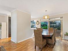  3/63 Park Street Como WA 6152 Located in a quiet street, this home is just a short stroll to both Coolgardie Reserve and Neil McDougall Park. With easy access to both Henley Street and Canning Highway this villa is ideally positioned for easy access to the Perth CBD and the Canning Bridge Train Station while also having convenient proximity to Curtin University, Penrhos and Wesley Colleges and Como Primary School. This spacious two-bedroom home has a sensible floor plan which features a large master bedroom with good sized wardrobes plus an additional second bedroom sizable enough to fit a double bed. The open plan living area is generous in size and there is a lounge room, dining and kitchen that have recently been renovated with timber floors, tasteful kitchen cabinetry, stone bench tops, built in wine rack and stainless-steel appliances. This opens onto the established outdoor gardens. New lighting ensures this area is light and bright at all times of the day or night. The bathroom has also been recently renovated and includes a bath with a separate toilet while the laundry tiling has also been upgraded. The grounds are reticulated and whilst easy care there is space for kids to play and pets to roam. There is undercover parking and rear storage shed. This generous home comprises 85sqm of building area and includes reverse cycle split system air-conditioning in the main living area and master bedroom. There is also a gas bayonet in the main living area for gas heating if preferred and the unit has been freshly painted throughout. A single level home of this size is rarely available within this highly sought after and convenient location. 