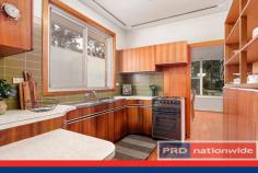  17 Old Forest Road Lugarno NSW 2210  $959,000 Rarely do you find the opportunity to buy large and level Lugarno land. Complimented by a much loved and cared for single level home, let your imagination run wild as you plan out your renovations or your new dream design (subject to council approval). Well equipped for the growing family offering four bedrooms and two living areas. The best part is the additional rooms out back, whether they be used as a studio, home office, teenage retreat or maybe a workshop for a tradie and their materials. All of this conveniently placed across the road from Lugarno public school and bus stop. * Light filled bedrooms all with built-in robes * Stunning ensuite with heated mirror & towel rail  * Timber floors, split cycle air-con, ceiling fans, solar electricity * New corrugated steel roof installed in 2016 * In-ground pool with external toilet & shower to wash down * Covered alfresco area great for entertaining * Exterior rooms - possible teenage retreat, office or home studio * Garage, carport and off-street parking for 2 more cars & a caravan * School and bus stop across the road * Short walk to local shops, cafe and park 