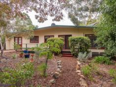  90 Scott Street Boya WA 6056 $449,000 Proudly displaying its mid-century credentials, this 1964-built home offers a sense of open, easy living with high ceilings, a flowing floorplan and a spectacular outlook to the enchanting Boya landscape. Sitting well back from the road, tall trees and a series of raised garden beds create a sense of privacy in a property that offers ample and an elevated rear deck with national park views and a below ground pool. 4 bedrooms 1 bathroom 1964-built bungalow Lounge library sunroom Formal & informal dining Beautiful timber floors Open-plan high/ceilings Elevated east facing deck Pool & garden sheds 2023 sqm adjoins reserve Schools, shops, NP views A broad gable roofline gives this home a sense of organic connection to its site and declares the aesthetic and floorplan that awaits behind the front door. A small front deck leads to the front door and into an expansive lounge/dining room. Jarrah floors glow against white walls and high ceilings with exposed beams emphasise the sense of light and space. Anchoring the lounge/dining room is a decorative, white painted fireplace with ornate mouldings, currently decommissioned, the present owners rely on reverse cycle air-conditioning for climate control. Double French doors open into a spacious timber-lined library, this flexible space could be adapted for use as a theatre room, home office or games/activity room. A separate kitchen is arranged at one end of the central living area and offers a freestanding oven, corner pantry and U-shaped bench. A large laundry adjoining the kitchen could be utilised as a larder or butler’s pantry. Further potential exists in the storage space accessible from the laundry. This light and spacious workspace opens to a small private courtyard. Arranged along the home’s eastern side is a large sunroom; a beautiful, elevated space and the perfect spot for whiling away a lazy afternoon, gazing out to the everchanging landscape of Greenmount National Park. If you prefer livelier pastimes, a wide sliding door opens the sunroom to the rear deck to create an indoor-outdoor entertaining zone with spectacular views. A large store room adjoins the laundry and opens to a small private courtyard. Two bedrooms are arranged off the sunroom, the larger features a walk-in robe and both enjoy views to the national park. All four of the bedrooms are a good size and share the family bathroom. Outdoors, paths lead to the below ground pool where a native landscape and views of the national park ensure privacy and a sense of floating in your private billabong. This sense of privacy is reinforced by the reserve adjoining the property’s rear boundary. There is much to love and much potential here; a mid-century home with multiple living areas, good-sized bedrooms and ample space to entertain. The 2023 sqm lot ensures privacy and a sense of space while the location puts good schools and the services and amenities of town within easy reach. 