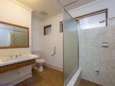  20 Innamincka Road Greenmount WA 6056 $319,000 Loved and cared for by the one owner for the last 48 years, this custom designed home, set on a big ¼-acre (1007sqm) block, boasts original elements and a functional floor plan to deliver a property with character and potential.  The comfortable brick and tile home features good sized bedrooms, a sunken lounge and a dining room with views across a patio to the big backyard. • Cherished 1 owner home • 2 bedrooms 1 bathroom • Spotless eat-in kitchen • Big sunken lounge room • Fabulous orig features • Good-sized bedrooms • Large family bathroom • Carport & garden shed • Mostly level 1007m blk • Cls to popular schools This cherished and happy 2 bedroom, 1 bathroom home has been maintained in immaculate condition by one owner. Original features bring charm and character, while a well-considered floorplan makes for comfortable, modern living. The ¼-acre lot, big backyard and super-convenient location – within easy reach of the services and amenities of town and the outdoor beauty of the Perth Hills – make for a home rich with possibilities and an attractive option for all buyers. A magnificent gum tree standing sentinel at the entry is your first hint of the generosity and welcome that imbues this property. A wide porch and tiled entry hall lead to a sunken loungeroom and dining area. A big picture window in the lounge area looks out to a green screen of an established garden. In the dining area, a sliding door opens to an elevated patio to create an indoor-outdoor entertaining area overlooking the expansive backyard. Reverse cycle air-conditioning and a northerly aspect bring year-round comfort to this flexible, open-plan living space with warm timber architraves and fresh, white walls. Adjoining the dining area is the original kitchen – impressive 70’s lino and the tiled splashback offer authentic style underlined by ample original cabinetry and a freestanding oven. A practical well-designed space, the kitchen is large enough to accommodate a breakfast table. Two good-sized bedrooms, the larger with a wall of built-in robes and a ceiling fan, share a large family bathroom with shower, Roman bath, vanity and W.C. The walk-through laundry opens to the paved carport on the home’s eastern side and an expansive backyard with a carob tree, pomegranate, frangipani and garden shed surrounded by a lawn and easy-care gardens filled with the sound of birdsong. This little gem is ready for new custodians and represents a fantastic framework on which to build your dreams. Its proximity to schools, services and amenities ensure its appeal now and into the future. Embrace the unmistakable charm of its 1970’s origins or take advantage of the ¼-acre lot and desirable foothills address to fashion your very own version of a happy home. 