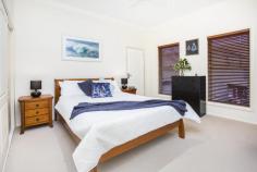  9 FLINDERS AVENUE, KIAMA DOWNS NSW 2533 This spacious light-filled home will be sure to impress! A beautifully maintained property nestled right between two beaches and only a short drive to Kiama's restaurants, shops, schools and transport. The main living area located upstairs features vaulted ceilings and hardwood timber floors, opening onto a sunny balcony perfect for entertaining and relaxing while enjoying the ocean outlook. The spacious kitchen provides plenty of room to work and ample cupboard space. Two bathrooms and four bedrooms, all with built-in robes, are also located upstairs. There is a large covered rear entertainment area with access to the backyard – a great spot to enjoy the afternoon sunshine. The downstairs area provides plenty of options with a separate external entrance as well as internal access to the main home, which can be locked off allowing guests to remain independent from the main house if desired. Another large bedroom is located on this level, along with a good-sized bathroom and a generous living area with enough space to incorporate a kitchenette or to set up a media or games room. The double garage has internal access and there is room on the driveway to park another four vehicles. This lovely property would suit the growing family as well as comfortably accommodating visitors. It could also be easily set up for holiday letting, ideal for those looking for some extra income potential. Be sure to inspect this impressive home located in a quiet cul-de-sac street within close proximity to beaches, shops, golf course and the pristine Minnamurra River. 