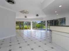  33 Valerie Street, Clontarf -  Waterfront Properties Redcliffe OVERLOOKING THE REDCLIFFE GOLF COURSE Overlooking the picturesque 18 hole Championship Golf Course in Clontarf, this prestigious home is beautifully presented and in a sought after location. From the family room, looking out over the rolling greens of the golf course is peaceful and relaxing. This magnificent home features: - Masterful design - Freshly painted inside - New carpet throughout  - Opulent main entrance leading to an expansive formal living room  - Elegant formal dining room  - Modern kitchen  - Family room with a built in bar overlooking the golf course  - 4th bedroom or home office with built-in cupboards  - Outdoor entertaining area with views of the golf course lake and fountains  - Outdoor spa with waterfall feature  - Generous size bedrooms  - Palatial ensuite and bathroom with floor to ceiling marble finishes and a luxurious spa bath and separate shower and powder room  - Ducted air-conditioning  - Security system/screens throughout  - Loft storage area the size of double lock-up garage  - Double lock-up garage Enjoy gatherings in the generously-sized living/dining area graced by a built in bar and magnificent outlook. With too many features to list and to appreciate all this home has to offer, inspection is an absolute must! Call Kevin today to arrange an inspection on 0418 125 356!! 
