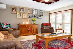  29 Atkinson Street Bellbird NSW 2325  $580,000 - $610,000 AS FAR AS GARAGES GO THEY DON’T BUILD THEM MUCH BIGGER! THE HOME – Family friendly home, four bedrooms all with built-in robes, three living areas & ensuite – Designer theatre room, perfect for teenagers or your own retreat for some peace, could be your 5th bedroom – Awesome outside entertainment area perfect for all seasons, 63m2 – fully sheltered – 5.5Kw solar system will keep the electricity bills under control THE GARAGE – 145m2- 17m x 8.5m – 4.8m height centre – See floor plan – internal wall & remote door split garage into 2 bays – perfect lock-up bay – 25m2 Mezzanine floor + electronic winch perfect for lifting heavy items – Five remote doors – great access – 3.3m door allows the biggest van, boat or machinery – Designated slab for a 21ft caravan, additional to separate garage – 1012m2 block, plenty of yard space Walk to Bellbird Primary, this is an ideal family property with loads of potential for a home business, storage, machinery you name it. It’s all yours! 