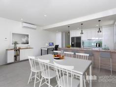  2 / 214 Hornibrook Esp, Woody Point -  Waterfront Properties Redcliffe Sea La Vie – SPECTACULAR BAYSIDE LIVING With brilliant , uninterrupted, beachfront vista featuring the Port of Brisbane, the Brisbane city and the gloriously illuminated bridge at night, your superb residence showcases ultimate in Bayside living. From the spacious courtyard securely protected behind high fences and gate, your new home is ideal for entertaining. Internally there are three large bedrooms, office and state of the art kitchen flowing through to the entertaining and outdoor patio presenting the world at your feet. The kitchen features luxurious, stunning granite benchtops, Two-Pac cupboards and soft closing drawers, quality Bosch appliances, air-conditioning and ceiling fans. The complex has a lift for easy portage of shopping from the two bay garage with double lock-up storage. Designed and built to the latest technological specifications including USB ports in all power points, category 6 cabling and Foxtel points to all rooms, NBN fibre optic to the apartment, video intercom service and crimsafe screens for added security. Your new apartment delivers spacious indoor and outdoor living, complimented by stylish fittings and finishes. Superbly located so that you can revel in the easily accessible water sports, endless waterfront parkland and pathways for walking, jogging or cycling and only three minutes to the local golf and bowls clubs - your long term health is assured when you make the move! Shopping, cafes, restaurants and public transport are a short stroll away. When you need to commute to Brisbane you are on the Bridge within a few minutes. Your ground floor apartment has an exclusive use rear courtyard coupled with a balcony to enjoy the joys of absolute beachfront living. All apartments in this boutique complex have 2 undercover, secure car spaces and double lock up storage units Call Mary today on 0438 054 227 to arrange a VIP inspection. 