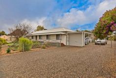  30 James Street  Kapunda SA 5373 $299,950 - $339,950 Ross Whiston is delighted to welcome you to 30 James Street, Kapunda. Country living in a charming home, on a large 1707sqm (approx.) allotment is calling as it is time for our delightful vendors to make way on their new adventure. Embrace the beautiful, rural surrounds and fantastic street appeal when approaching the home. A timber deck verandah leads you to a formal entrance, which opens onto a generous 148sqm interior. Upon entry you are greeted by the formal lounge, which features split system heating / cooling and a large picture window, showcasing the front manicured gardens which have had years of love and care invested in them. Space will never be an issue in the adult's retreat! This room boasts rich timber flooring, 2 large picture windows, a TV antenna point, outdoor access, a storage cupboard and a study tucked politely around the corner. Extremely generous in size, this room can be utilized however you may desire. The large kitchen flaunts stainless steel appliances, endless amounts of cupboard & bench space, dishwasher, a walk-in pantry and is finished in sparkling white. A separate, open dining is positioned directly across from the kitchen and can comfortably house a large dining setting. The master bedroom is an absolute haven, complemented with timber flooring, neutral tones and a huge walk in robe with endless storage space, all this while being conveniently positioned near the main bathroom. Bedroom 2 is generous in size, fitted with timber flooring and is also serviced by the main bathroom. The modern bathroom presents in sparkling white, with a separate toilet and separate bath/shower area. Comfortably entertain during all seasons with the lengthy, undercover entertaining area fitted with clear, vinyl roller blinds. The yard has been completed with two of nature's finest, bottle brush & fig trees and although Kapunda Food Works is only a 3-minute drive, you can limit the trips with the orange, cherry, plum, nectarine, apple, pear & apricot trees that surround. Other features that should not be overlooked include: ducted evaporative cooling, two 23,000L rain water tanks, a 24,000L rain water tank, below surface watering system, vegetable garden beds, a potting/garden shed, security system, roller shutters, single car garage with automatic roller door and a 14.5m x 5.5m shed completed with concrete and power connected. Located close to sporting facilities, schools, pub/restaurants, shops and cafes, you will never need to trek far out of the vibrant & historic town of Kapunda. A new chapter is waiting to be written, contact Ross on 0418 643 770 today to organise your exclusive show through or for any further enquiries. Want to find out where your property sits within the market? Have one of our multi-award winning agents come out and provide you with a market update on your home or investment! Call Ross WHiston on 0418 643 770 or click on the following link http://raywhitegawler.com.au/sell/property-appraisal/ Ray White Gawler | Willaston, Number One Real Estate Agents, Sale Agents and Property Managers in South Australia. Disclaimer: Every care has been taken to verify the correctness of all details used in this advertisement. However no warranty or representative is given or made as to the correctness of information supplied and neither the owners nor their agent can accept responsibility for error or omissions. FEATURES: Air Conditioning Alarm System Close To Schools Close To Shops Close To Transport Garden Polished Timber Floor! 