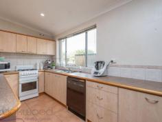  24 Parmelia Way Bassendean WA 6054 $449,000 Humming with a 60s vibe, this 3 bedroom, 1 bathroom home has been expanded by the addition of a 1 bedroom, 1 bathroom granny flat. The original home retains much of its charm¬; large windows, high ceilings and open-plan living. The granny flat sits under the main roofline and offers separate, self-contained accommodation for relatives or guests. A below ground pool with a poolside entertaining area along with a spacious covered patio delivers ample space for outdoor entertaining. 4 bedrooms 2 bathroom 1968-built brick and iron Open-plan family/meals Brick-surround fireplace Orig timber floorboards Iconic period windows Separate SC 1-bed flat 20 minutes to airport 728 sqm block w bore Convenient & connected The broad span of a low-slung roofline, triangular, highlight windows, open-plan living and original timbers floors mark this home as a classic. The 1968-built, 3 bedroom, 2 bathroom property has is expanded by the addition of a 1 bedroom, 1 bathroom granny flat. The roofline extends to form a carport and entertaining area along the side of the home. From here, a step up takes you into the open plan family/dining room with its sloping ceiling, narrow floorboards and brick surround fireplace. Adjoining the family/meals area is a galley kitchen with a freestanding oven, dishwasher and light-timber cabinetry. A central hallway leads to three good sized bedrooms, all with high ceilings, the main with built in robes. The bedrooms share a family bathroom fitted with a Roman bath, shower and vanity. The walk-through laundry boasts good storage and opens to a separate W.C. A 1 bedroom, 1 bathroom flat offers fantastic accommodation for a teen, elderly parent or could be used as guest quarters. This self-contained space consists of a bedroom, central lounge, a small kitchen and a bathroom with a shower, vanity and W.C. Central to the fully fenced backyard is a below ground pool with a covered poolside entertaining area – the perfect spot for lazy weekend barbeques or memorable celebratory get-togethers. Whether you are looking for your first home or have a passion for 60s design, this home is a great find. The property has the potential to become a mid-century marvel and offers comfortable living with a choice of outdoor entertaining spaces. A level block, large brick garage with room for workbenches and bore-fed reticulation add to the property’s appeal. Mere steps from a playground and reserve, the Swan River and Bassendean shopping hub are also within easy reach. Close to public transport, the airport and offering easy access to major arterial roadways, this location is attractive to young families, FIFO workers and serious investors alike. 