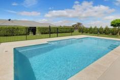  43 Bonnett Drive  Goulburn NSW 2580 $970,000 - $1,050,000 Beautifully presented and recently renovated this 4 bedroom plus study family home will suit a growing family embracing the semi-rural lifestyle while still being conveniently located to town. Positioned in the ever popular Run-O-Waters Estate on the southern side of town - with easy access to the Hume Highway, only 45 min to the edge of Canberra and an easy 1.5hr to Campbelltown. Features include: • 	 4 large bedrooms, all with built-ins. The commodious main bedroom will impress with the spacious walk-in-robe and the double shower in the ensuite. • 	 Separate study with built-in or optional 5th bedroom. • 	 Formal lounge and dining rooms • 	 Kitchen has been tasteful renovated with caesar stone bench tops and ample cupboard space. • 	 Ducted heating throughout and reverse cycle air conditioning. • 	 Main bathroom and ensuite has been renovated • 	 Undercover BBQ area, perfect for those upcoming summer nights • 	 Solar heated in ground fiberglass pool • 	 2.76 acres of land with sub- division potential STCA. FEATURES: Air Conditioning Alarm System Built-In Wardrobes Close To Schools Formal Lounge Garden Pool. 
