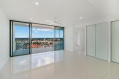  904/9-11 'Bay Grand Apartments' Enid Street Tweed Heads NSW 2485 $650K - $690K  From the moment you open the door of your brand new apartment, you will be spell bound by the majestic 180 degree views of the Tweed River, Seaway & the Pacific Ocean, including Cook Island.  This sleek & crisp (2) bedroom apartment is located on the top floor (9th level) and offers secure & comfortable living with a myriad of lifestyle conveniences at your finger-tips.  KEY FEATURES:  - Open plan tiled living & dining  - Stylish kitchen w dishwasher & gas cooktop  - Master bedroom w ensuite & balcony access  / amazing sea views  - Generous terrace style balcony to relax & enjoy the views  - Secure basement parking  - Pet friendly  ADDITIONAL FEATURES:  - Ducted air-conditioning  - Ceiling fans  - Resort style lap pool & gym facilities  - BBQ facilities  DETAILS:  Body Corporate - $70 approx. per week  Rates - $TBA  Market Rent - $525-$550 per week  Holiday Market weekly tariffs - (please refer to www.goldcoastholidayhomes.com.au for letting & management advice)  LOCATION:  This brand new apartment is extremely well positioned on the cusp of Coolangatta CBD & Tweed central. Therefore, you can leave your car at home and stroll to a smorgasbord of cafes, with major shopping at the end of the street.  In addition, you are walking distance to the Tweed Hospital, Bowls Club and local beaches at Coolangatta & Rainbow, which are so close you can smell the salt in the air!  AGENT'S COMMENTS:  A brand new abode, super convenient and ready to welcome its first resident, lucky you!  Nothing to do but move in and enjoy, it's quite possible you will never want to leave'.  