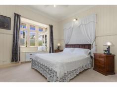  70 Kent Street New Farm QLD 4005 This charming property for over thirteen years has been the renowned ‘Cream Gables’ a council approved Bed and Breakfast home business. There are a multitude of other options for this property such as: long term room/suite rentals, a grand two storey home ideal for an extended family or the perfect set up for dual occupancy. The configuration of the property allows for all these options to occur effortlessly. This beautifully maintained residence in the heart of New Farm is a rare offering and must be inspected to be truly appreciated. An Information Memorandum or inspection is available upon request! 7 Bedrooms, 5 Bathrooms, 4 Car Spaces Ground Level: – Three bedrooms and three bathrooms – All bedrooms are ensuited and provide direct access to outdoor living spaces – Kitchen, living and dining feature polished timber floors – French doors open to rear covered patio – Front enclosed courtyard – Wheelchair friendly and ceiling fans throughout – Two laundry’s, one internal and other in garage – Two remote controlled lock up garages and two additional off-street spaces First Floor: – Four bedrooms and two bathrooms – Master bedroom with ensuite and bay window – Three of the four bedrooms open onto outdoor living spaces – Spacious open plan living and dining – Kitchen flows from living and dining onto large rear covered deck – Private front verandah and enclosed sunroom – Polished timber floors, high ceilings, VJ’s, decorative fretwork, archways and french doors – Air-conditioned and ceiling fans throughout – Rear deck overlooking luscious landscaped gardens – Outdoor sundeck sanctuary with retractable shade sail overlooking spa Positioned on a 392m2 block bordering Fortitude Valley and Brisbane City just metres from local shops, cafes, restaurants, schools and public transport. The Howard Smith Wharves have opened to the public and provides two glass lifts from the top of the cliffs to the boardwalk, one at Bowen Terrace and one in Wilson Outlook Reserve bridging the gap between the city and New Farm, the HSW includes a new riverside parkland, dining, retail, tourism centre and spaces for hosting events such as cultural and food festivals through to restaurants and the bars making this an exciting new destination for tourists and residents. This prime location allows easy access to both the Gold and Sunshine coasts and the Brisbane Airport. 