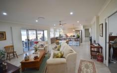  48-54 MARTIN PLACE TAMBORINE QLD 4270 $899,000.00 This amazing 4078 m2 Elevated property is in the Prestige "Riemore Downs" in one of best and ideal locations of Tamborine Village. This particular property boasts stunning views of Tamborine Mountain and the surrounding Ranges. This Architect Designed home was created by the current owners, who did not plan to leave so soon, as it is less than 12 months old.  Reluctant as they are, this will be to your benefit, as money was not spared in the making it literally a "Dream Home".  Loads of Bells and Whistles as you walk around the five bedrooms, all with built in robes, the master with walk-in and ensuite, the spacious well designed open plan kitchen, has stainless steel appliances with a 900mm Gas stove with Fan Forced oven, Stone bench tops and a very efficient walk in Butler's Pantry. The open plan living has thoughtfully set up three separate living areas, offering you a large family room and lounge that leads out to the Alfresco with a great entertainment and BBQ area.  Light and Airy with reverse Cycle Split Systems Air Conditioning as well as ceiling fans throughout the complete house. Back to the Grid 6klw Solar power keeps the bill very low.  Simple low maintenance design Landscape with a 16m x 9m Colourbond Shed, with plenty of room for a pool or a larger shed should you desire.  You will be impressed by this home and not disappointed.   Airconditioning, Broadband, Built In Robes, Courtyard, Dishwasher, Ducted Cooling, Ducted Heating, Ensuite, Fully Fenced, Grey Water System, Open Spaces, Outdoor Entertaining, Pay TV, Remote Garage, Rumpus Room, Secure Parking, Shed, Solar Hot Water, Solar Panels, Water Tank, Workshop, 