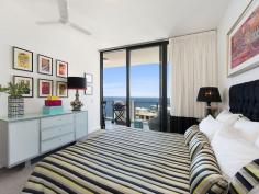  1202 / 99 MARINE PARADE, Redcliffe -  Waterfront Properties Redcliffe Penthouse in Mon Komo's Residential tower! Your Redcliffe Peninsula ‘Sea-change’ awaits you!  If you’ve always dreamed of upmarket apartment living right in the heart of Redcliffe, then you simply must add this Penthouse to your short-list!  Situated in a quiet location on the top floor of the classy Mon Komo separate Resident’s Tower, you will enjoy magnificent south-facing views that encompass the gorgeous city and Port of Brisbane night lights.  This 148m2, two-bedroom plus study apartment is exquisitely presented so you will be able to envisage just moving in and enjoying the huge open-plan living area – which comfortably accommodates the largest of dining settings to entertain family and friends.  However, due to the superb location, you are more likely to be wandering down the street to enjoy the many cafes and restaurants in the heart of Redcliffe, visiting the popular lagoon with the grandchildren or simply strolling the gorgeous waterfront taking in the fresh sea air!  Bluewater Square (which hosts Woolworths, BWS, a pharmacy, Doctors surgery, etc.) and public transport is just a few metres from the Mon Komo complex, so you’ll find that such a convenience. You’ll also enjoy the facilities that Mon Komo itself offers – two pools, gym, hotel, restaurant and accommodation for guests. It really is all about LIFESTYLE… You’ll never feel so relaxed as you will moving into an easy ‘lock-up and go’ apartment with no yard or house maintenance to worry about.  This Penthouse has the added bonus of having 7m2 of lock-up storage along with two car spaces in the secure ‘residents only’ basement carpark. So if you are not quite ready to part with some of your treasures, then you’ll have great storage for them… Check out some of the features of Unit 1202:  •	Two great-sized bedrooms  •	High-end bathroom and ensuite  •	High ceiling and very spacious living area  •	Great-sized kitchen with high-end Miele appliances and gas cooking  •	Separate laundry  •	2 secure car spaces + 7m2 storage  •	Indoor + outdoor pool + gym in complex  •	Impressive entrance foyer to resident’s tower  •	25 minutes to Brisbane airport  •	Stunning bay, city and Peninsula views All this for Offers over $899,000! You really must come and see why this Penthouse is so special. Call Karen Prince on 0437 015 951 to arrange your private inspection now… *** OPEN HOME INSTRUCTIONS ***  This apartment is in the 'Resident's Tower, not the Vacation Tower. The entrance is accessed from the Sutton Street side of the Mon Komo complex. There is an intercom system, so if no-one is at the entrance, then push 1202 and the green bell. Otherwise please call my mobile and I will meet you at the doorway. 