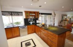  3119 Beechmont Rd Witheren QLD 4275  $989,000 This is a rare opportunity to acquire three homes for the price of one, a Five Acre "Boutique Equestrian" property that is divided into four good sized paddocks backing onto the "Coomera River" with amazing views of the surrounding Ranges, Located just 5 minutes from the popular Country Town of Canungra which is a comfortable 15minute drive to Nerang and the Pacific Hwy.  The Main Residence has four bedrooms three with built in robes, the master with a walk-in, with ensuite with a separate main bathroom and laundry, an open plan lounge, Rumpus and separate formal dining room, Kitchen with country styled timber cupboards and granite work tops, stainless steel appliances with gas cooktop and fan forced oven dishwasher etc, a wood burning fire place, ducted air conditioning and ceiling fans throughout. There is a large salt chlorinated in-ground pool and a Carport with parking for three cars plus a large covered parking area for a Boat & Caravan, with a separate workshop or office, with a separate 5kw back to the grid Solar System plus hot water system. The separate one bedroom Granny Flat has had a complete makeover is fully self contained with a split system A/C plus ceiling fans and could be used for Air B&B with a huge demand in this location. The Cottage is large and comfortable with a timber deck and inviting rural views, one bedroom with built in robes, a split system air-conditioning & Ceiling fans, a compact kitchen and modern bathroom. This fully fenced property includes a netted orchid of fruit trees and an established veggie patch, plus a fully enclosed set of dog kennels with runs and finally, a fully covered and enclosed area for the "Chooks" As you walk around the property you will be aware of the well manicured gardens that the current owners have loved and cared for over the years! The current owners have to down size and move on. For Inspections of this property please call John on 0412 571 900.   Airconditioning, Broadband, Built In Robes, Courtyard, Deck, Dishwasher, Ducted Cooling, Ducted Heating, Ensuite, Fully Fenced, Grey Water System, In Ground Pool, Open Fireplace, Open Spaces, Outdoor Entertaining, Pay TV, Rumpus Room, Secure Parking, Shed, Solar Hot Water, Solar Panels, Split System AirCon, Split System Heating, Water Tank, Workshop, 