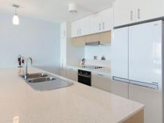  16 / 146 Prince Edward Parade, Scarborough -  Waterfront Properties Redcliffe Right on the Bay! There are just so many features to enjoy if you move into 'The Bay' complex at Scarborough - which is described by residents as a "Happy building". Not only is Unit 16 a very spacious (199m2) three bedroom apartment, but its design is practical and well thought out. With views that cannot be built out you will always be able to enjoy the gorgeous Bay outlook plus the delightful pretty night lights of both Redcliffe and all the way back to the Port of Brisbane. It's important for buyers to know that any new home built on the visible vacant block has a height restriction - the same level as the ones either side, so you will always have a water view. The very large Master bedroom opens up to the balcony facing the Queens Beach, so you can fall to sleep listening to the water lapping at the foreshore. Both ensuite and spare bathroom are bigger than most and the apartment has tons of storage cupboards throughout. Superbly located approximately halfway between Redcliffe and Scarborough, you can walk out the door and decide which way you fancy wandering off for your morning walk!  It's such a desirable lifestyle choice with happy residents who enjoy an living in an attractive, well-serviced building. The lovely foyer features a gorgeous pool, spa, gym and large common area.  Even the secure basement carpark is well-serviced, with a bathroom (ideal if you are downstairs in your garage area),a car wash station along with direct access to the beachfront via a tunnel walkway (meaning you can wheel a kayak or bikes from your garage through to the waterfront). Fully enclosed double garages are rare in unit complexes and this one is certainly bigger than average with plenty of storage room - perfect for those down-sizing from larger family homes who still want somewhere to 'potter or tinker'.  As there is no road in front of this unit, there is minimal (if any) traffic noise either! This lovely apartment is well worth an inspection, so it should definitely be on your list of apartments to view! This unit features: •	Spacious 199m2 of living  •	Three good-sized bedrooms  •	Study nook  •	Large bathrooms  •	Separate laundry  •	Two separate balconies  •	Water views from your kitchen, living area and front balcony  •	Plantation shutters throughout  •	Freshly re-painted internally  •	Access to pool, spa, gym roof-top  •	Great location with direct access to walking paths and the beach  •	Large double lock-up garage in secure basement carpark  •	NBN ready You need to make an appointment to view this apartment to appreciate all of the above, so call Karen Prince now on 0437 015 951 to arrange a time! 