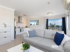  2 / 102 Hornibrook Esplanade, Clontarf -  Waterfront Properties Redcliffe YOUR PIECE OF PARADISE Superbly renovated, spacious and secure. Nestled in an absolute beachfront position showcasing views towards the bridge, city and Pelican Park sits this lovely renovated unit. Spread over 104 sqm with 2 spacious bedrooms, new bathroom and kitchen your new investment needs nothing to be done. Enjoy the sensational views and cool, ocean breezes from your elevated 1st floor balcony. Take a walk along the waterfront walkways to nearby cafes, restaurants and the historical Belvedere Hotel, cast a line in, BBQ in the park, or launch the boat from the ramp. Features:  •	Small secure complex  •	Large open plan kitchen, living and dining area with stunning water views  •	Beach and parks across the road  •	Air conditioned and ceiling fan  •	2- Pac renovated kitchen with stone bench tops, exhaust fans and soft close drawers  •	Two good size bedrooms with built-in wardrobes  •	Spacious renovated bathroom with 2-Pac vanity, shower and toilet  •	Single remote lock-up garage with laundry and storage  •	Low body corporate Rates call Mary to inspect 