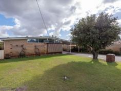  24 Parmelia Way Bassendean WA 6054 $449,000 Humming with a 60s vibe, this 3 bedroom, 1 bathroom home has been expanded by the addition of a 1 bedroom, 1 bathroom granny flat. The original home retains much of its charm¬; large windows, high ceilings and open-plan living. The granny flat sits under the main roofline and offers separate, self-contained accommodation for relatives or guests. A below ground pool with a poolside entertaining area along with a spacious covered patio delivers ample space for outdoor entertaining. 4 bedrooms 2 bathroom 1968-built brick and iron Open-plan family/meals Brick-surround fireplace Orig timber floorboards Iconic period windows Separate SC 1-bed flat 20 minutes to airport 728 sqm block w bore Convenient & connected The broad span of a low-slung roofline, triangular, highlight windows, open-plan living and original timbers floors mark this home as a classic. The 1968-built, 3 bedroom, 2 bathroom property has is expanded by the addition of a 1 bedroom, 1 bathroom granny flat. The roofline extends to form a carport and entertaining area along the side of the home. From here, a step up takes you into the open plan family/dining room with its sloping ceiling, narrow floorboards and brick surround fireplace. Adjoining the family/meals area is a galley kitchen with a freestanding oven, dishwasher and light-timber cabinetry. A central hallway leads to three good sized bedrooms, all with high ceilings, the main with built in robes. The bedrooms share a family bathroom fitted with a Roman bath, shower and vanity. The walk-through laundry boasts good storage and opens to a separate W.C. A 1 bedroom, 1 bathroom flat offers fantastic accommodation for a teen, elderly parent or could be used as guest quarters. This self-contained space consists of a bedroom, central lounge, a small kitchen and a bathroom with a shower, vanity and W.C. Central to the fully fenced backyard is a below ground pool with a covered poolside entertaining area – the perfect spot for lazy weekend barbeques or memorable celebratory get-togethers. Whether you are looking for your first home or have a passion for 60s design, this home is a great find. The property has the potential to become a mid-century marvel and offers comfortable living with a choice of outdoor entertaining spaces. A level block, large brick garage with room for workbenches and bore-fed reticulation add to the property’s appeal. Mere steps from a playground and reserve, the Swan River and Bassendean shopping hub are also within easy reach. Close to public transport, the airport and offering easy access to major arterial roadways, this location is attractive to young families, FIFO workers and serious investors alike. 