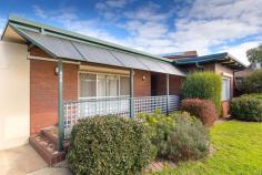 315 Balston Street Lavington NSW 2641 $239,000 Perfectly positioned on a small corner block, with side access for caravan parking etc. This tidy home represents fantastic buying. With three generous bedrooms, all with built in robes and a split system air conditioner in the master. The lounge room has a cosy natural gas heater and a split system air conditioner, whilst the light filled sunroom at the back has electric roller shutters for the hot summers. The kitchen is near new and offers a pantry, dishwasher and electric cooktop and oven. The centrally located bathroom is also near new and has a separate WC. The remote garage door allows access to the rear of the home and a small workshop area with roller door. The small but picturesque yard has a lovely gazebo, fruit trees and an aviary for birds or chooks. Situated amongst other much loved homes and close to schools and shopping centres, this home is priced to sell quickly. It a perfect low maintenance home for the budget conscience of as an investment would rent for $300 per week. FEATURES: Air Conditioning Built-In Wardrobes Close To Schools Close To Shops Close To Transport Garden 