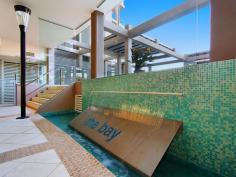  16 / 146 Prince Edward Parade, Scarborough -  Waterfront Properties Redcliffe Right on the Bay! There are just so many features to enjoy if you move into 'The Bay' complex at Scarborough - which is described by residents as a "Happy building". Not only is Unit 16 a very spacious (199m2) three bedroom apartment, but its design is practical and well thought out. With views that cannot be built out you will always be able to enjoy the gorgeous Bay outlook plus the delightful pretty night lights of both Redcliffe and all the way back to the Port of Brisbane. It's important for buyers to know that any new home built on the visible vacant block has a height restriction - the same level as the ones either side, so you will always have a water view. The very large Master bedroom opens up to the balcony facing the Queens Beach, so you can fall to sleep listening to the water lapping at the foreshore. Both ensuite and spare bathroom are bigger than most and the apartment has tons of storage cupboards throughout. Superbly located approximately halfway between Redcliffe and Scarborough, you can walk out the door and decide which way you fancy wandering off for your morning walk!  It's such a desirable lifestyle choice with happy residents who enjoy an living in an attractive, well-serviced building. The lovely foyer features a gorgeous pool, spa, gym and large common area.  Even the secure basement carpark is well-serviced, with a bathroom (ideal if you are downstairs in your garage area),a car wash station along with direct access to the beachfront via a tunnel walkway (meaning you can wheel a kayak or bikes from your garage through to the waterfront). Fully enclosed double garages are rare in unit complexes and this one is certainly bigger than average with plenty of storage room - perfect for those down-sizing from larger family homes who still want somewhere to 'potter or tinker'.  As there is no road in front of this unit, there is minimal (if any) traffic noise either! This lovely apartment is well worth an inspection, so it should definitely be on your list of apartments to view! This unit features: •	Spacious 199m2 of living  •	Three good-sized bedrooms  •	Study nook  •	Large bathrooms  •	Separate laundry  •	Two separate balconies  •	Water views from your kitchen, living area and front balcony  •	Plantation shutters throughout  •	Freshly re-painted internally  •	Access to pool, spa, gym roof-top  •	Great location with direct access to walking paths and the beach  •	Large double lock-up garage in secure basement carpark  •	NBN ready You need to make an appointment to view this apartment to appreciate all of the above, so call Karen Prince now on 0437 015 951 to arrange a time! 