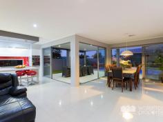  21 FREYA COURT, Newport -  Waterfront Properties Redcliffe ISLES OF NEWPORT - MULTI GENERATIONAL LIVING ISLES OF NEWPORT –  IDEAL MULTI-GENERATIONAL LIVING This much loved family home is reluctantly offered for sale  If you are seeking a prestigious residence to accommodate a multi- generational family throughout 50 squares of living space, then look no further.  Beautifully finished to satisfy all your wants, this home has been designed to meet the needs of a growing family. Encompassing multiple living areas over two levels, providing 3 spacious bathrooms, glorious master en-suite, and 5 bedrooms plus study, all your wants are catered for in luxury and style. The downstairs wing or granny flat, will provide comfort, security and space for the older generation yet still making them an integral part of the family dynamic.  If you need 5 bedrooms, with a fabulous parents retreat overlooking the waterway and views of the Glasshouse mountains.  If you want direct access to the upper level indoor/outdoor living area from both master suite and living space.  If you want a fabulous, private pool with cabana.  If you want to enjoy the benefits of waterfront living then this is the home for you and your family.  Features include:  •	Stunning and stylish kitchen with butlers pantry,  •	3 car accommodation  •	3 bathrooms  •	Large self contained office  •	Multiple living areas  •	Views to the Glass House Mountains and Canals  •	Solar heated pool with covered entertaining area  •	Pool and poolside Cabana  •	Fully fenced with manicured lawns and garden This immaculate home is listed well below replacement cost. Inspection is a must. Call Mary NOW on 0438 054 227 to arrange an inspection. 
