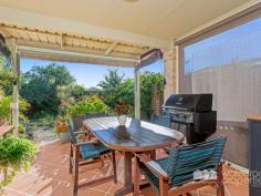  22 DONKIN STREET, Scarborough -  Waterfront Properties Redcliffe Perfect lowset home for Retirees - walk to the water! This wonderful property is all about enjoying a peaceful, easy Scarborough lifestyle. If you love the idea of living just a few metres to Scarborough's beautiful Queen's Beach, then this fabulous 3 bedroom lowset brick and tile home is a must-see. It is simply perfect for retirees who realise that apartment or retirement village living is just not for them!  In fact, this home would suit all types of buyers, as it's just a short walk to schools, public transport and Scarborough Village. You'll love being able to meander down to Scarborough Village to have coffee or lunch. If you are a walker or cyclist, you can access the gorgeous waterfront pathway just down the end of Donkin Street and wander off in either direction. This fabulous location simply ticks so many boxes! Don't let the street frontage deceive you - this home is actually very spacious, with two separate living areas, a dining room, three good-sized bedrooms, large bathroom and ensuite. The home is already discreetly set-up as a 'senior-friendly' residence with some hand rails, an open walk-in shower in the ensuite and a ramp at the front entrance. If you enjoy gardening but don't want a huge yard, then you'll appreciate this lovely private 418m2 block, which is lush with plants ready to be groomed and loved - just as the previous resident did prior to becoming unwell. With it's delightful north-facing patio, you'll find yourself sitting outside enjoying a cuppa even in the winter! Sleep in peace with the Master bedroom at the rear of the house where it is light, airy and just wonderfully cosy in this seasonal weather.  A fresh lick of paint would have this lovely home sparkling in no time! Come and see for yourself... With the market now buzzing again, don't delay your inspection or you might just miss out! 22 Donkin Street, Scarborough features: Three spacious bedrooms  Two generous living areas  Dining area  Good-sized kitchen  North-facing patio  Private 418m2 block  Double lock-up garage + extra off-street parking  Split system air-conditioners  Walk to Scarborough Village and waterfront  Senior-friendly home  Quiet sought-after location Call Karen Prince now on 0437 015 951 to arrange your inspection! 