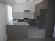  8/2 Jefferson Court Upper Coomera Qld 4209 -  Bloor Homes Property Management 3 Bedroom spacious townhouse with ducted air con, in quiet complex Townhouse   - Upper Coomera  QLD Available on August 31, 2019! 3 Bedroom spacious townhouse with ducted air con, in quiet complex This spacious townhouse has 3 large bedrooms, master with ensuite and balcony. Main bathroom has bath and there is also a powder room downstairs for easy access. Bedrooms all have ceiling fans and built-in robes and ducted air con. Downstairs there is a spacious lounge/dining room with split system air con. Modern kitchen has plenty of cupboard space, dishwasher and large fridge cavity. Gas cooktop and gas hot water makes this property very efficient for tenants. Complex borders reserve at the back, which has walking tracks and dog exercise area. Property has single lock up garage, with room to park another car on the driveway. Jefferson Court has a swimming pool, gymnasium and function room and two BBQ areas – all for resident’s use. Walking distance to Saint Stephens College, local state schools, Coles Shopping Centre and Medical Centre, this property is a must for inspection. Email or Call us today on 55199220 to arrange a time to show you thru. 