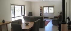  10A Tyrel St, Stanthorpe QLD 4380 $595,000 Here is the opportunity to enjoy this wonderful lifestyle on 4102m2 (one acre) of level spacious land in a natural semi bushland setting in a well recognised residential part of Stanthorpe - within a few minutes drive to the main street, schools etc or take and an easy enjoyable stroll along the parklands and walkways. The low set brick residence was built for its current owners in 2014 and is in absolute immaculate condition with full wall/ceiling insulation, fully screened (incl crimsafe), 2.7m high ceilings, laminated windows, ceiling fans and compliant smoke alarms. The open plan lounge/dining with ideal north/east aspect offers an easy flow of living space with natural light and warmed by a Nectre Mk2 wood heater. This area flows to a family/hobby room which can be closed off to offer extra separate family space. The well designed kitchen has caesar stone benchtops, 5 burner gas stove, electric oven, good size walk in pantry, double bowl sink and over head bench lighting. Casual entertaining is made extra easy and enjoyable with the adjoining fully screened sunroom/BBQ area. There are 4 bedrooms : the main has a full length wall of built ins, large ensuite with double basins, generous size shower and separate toilet. Two other bedrooms have built ins and the 4th could be used as a study. The family bathroom has sep bath, sep shower and sep toilet. The laundry is separate with direct rear access and the remote contolled garage has direct internal access and a full length wall of terrific storage cupboards. There are 2 x gas instantaneous hot water systems. Outside there is a choice of sheds! One is approx 7.5 W x 6.0 L x 2.7 H, insulated, power, lights, 1x15 amp point, 2 x10 amp points. The adjoining steel carport is approx 6.3 W x 9.00 L x 3.0 H (ideal for caravan), garden shed (4 x 3.1 x 2.5H) plus a wood shed - all have concrete floors. There is a Taylex treatment plant, 2 tanks (total 20,000 litres), a bore plus TOWN WATER. The property has an automatic watering system, is fully fenced with 1200mm sheep mesh and weldmesh plus a fenced area for vegies or small pets! 