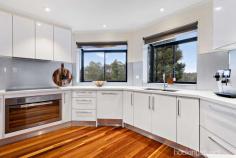  13 Barnard Court Epping VIC 3076 $980,000 - $1,070,000 Uniquely conceived and completed to meet its owner/builder's own, exacting personal brief, this architect designed home's sublime family spaces overlooking Findon Creek Park are only moments from many leading schools including St Monica's College - which is within easy walking distance. A series of superb, light-filled zones for living, dining and entertaining are complemented by a separate study/home office and 4 bedroom, 3 bathroom accommodation of unlimited luxury featuring a main bedroom/retreat with walk-in-robes and an ensuite straight from the pages of a fabulous style magazine. Stunning balcony proportions and desirable garden dimensions deliver exceptional outdoor enjoyment, accompanied by a secure double garage, further enhancing a home where gleaming timber tones, sophisticated stone surfaces and a kitchen equipped with elite stainless steel appliances reflect the commitment to quality that is the signature of an address that's clearly ahead of its time - and unequivocally one of a kind. 