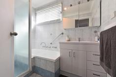  7 Asquith Avenue Windermere Park NSW 2264 $480,000 - $510,000 A leafy address plays host to this charming single-level home set on amongst well-tendered gardens and effortlessly blending its traditional cottage appeal with modern touches. With well-scaled proportions, a free-flowing layout and large picture windows catching pretty views, the home unites broad entertainer appeal with an inground pool being a terrific outdoor centre-piece. A flexible two-bedroom design with a large living space, generous sunroom and separate one-bedroom sleep-out off the garage provide every essential for complete comfort. – Stylish living room finished in mondern tones and warm timber flooring – Practical kitchen with good storage, electric cooker and dishwasher – Versatile sunroom framed by leafy views over the lengthy backyard – Outdoor appeal with alfresco areas, a naturally set pool and lovely gardens – Two bedrooms with robes, bathroom with separate shower and tub – One-bedroom sleep-out with air-conditioning and bathroom – Secure single garage with extra parking bays in the driveway – The beautiful inlet of Lake Petite is an easy stroll – just a block away – Boating, boat ramps, fishing and swimming all at your fingertips.. 