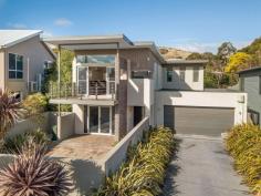  62 Pindos Drive Tranmere TAS 7018 $695,000 Showcasing a cutting edge design that offers an uncompromising level of quality over two levels, this superbly appointed executive home offers the best of everything in an exclusive Tranmere location. Featuring a state of the art kitchen with stainless steel European appliances and silestone benchtops, light filled open plan living with Derwent river views and direct access to dual alfresco entertainment decks. Three double bedrooms plus a guest room or fourth bedroom are complemented by a superb ensuite and stunning main bathroom, whilst the neutral tones throughout will coordinate with any style of furniture. The remote controlled three car garage offers a fantastic opportunity to develop additional living or rumpus space, and there is an abundance of storage under the home. Level landscaped rear gardens and private front courtyard completes this lifestyle package set in elite surroundings. Contact Ant or Simon for further details or to arrange your inspection. FEATURES: Air Conditioning Built-In Wardrobes Close To Schools Close To Shops Close To Transport Garden... 