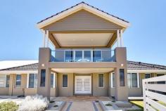  21 Wrasse Corner Yanchep WA 6035 $669,000 - $689,000 Be captivated from the moment you arrive – this prestigious beachside residence is nothing short of impressive with generous open plan design and versatile living spaces, this family home is a dream by the sea. Totally energy efficient with 6.4kw solar electricity, just a stones throw to sparkling beaches, and only minutes from Yanchep Central Shopping Centre, schools, medical facilities, cafes, Yanchep National Park, Golf Course and more, you won’t find better value on the coast! Features of this immaculate home include: + Stunning street appeal with fully enclosed courtyard and decked outdoor lounge area. + Vast open plan kitchen, dining and family areas – gourmet kitchen equipped with stone tops, walk-in pantry, plentiful cupboard and bench space and quality appliances + Step outdoors to an enticing entertainers retreat with built-in BBQ & pizza oven under a large alfresco, sleek split level decking area with heated plunge spa pool and under cover built in bar + King sized master bedroom with spacious double vanity ensuite plus spa bath & walk in robe + 3 queen sized bedrooms with double robes + Semi-ensuite & powder room to bed 1 and a stylish family bathroom for beds 3 & 4 + Upstairs features an expansive living area or 5th bedroom with ample storage, stylish kitchenette, and an inviting balcony area with awesome ocean views VALUABLE EXTRAS: 6.4 kw solar electricity, ducted reverse cycle air-con, downlighting throughout, quality window and floor treatments, double remote garage, low-maintenance gardens to front, electric shutter door to alfresco, ample storage space, laundry and so much more… 