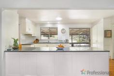  42 Uralla Road Armidale NSW 2350 $400,000 - $440,000 Your family will feel right at home in this welcoming, light-filled 4-bedroom property just 7 minutes from the heart of Armidale. The bright interior feels fresh and contemporary, with a spacious open plan living and dining room, finished with floorboards throughout. Curl up on the lounge with a good book and enjoy the cosy wood fire during winter. The modern, roomy kitchen overlooks the backyard and is complete with an enormous bench, large pantry and plenty of cupboard space.  Three bedrooms are complete with built-ins, and the master bedroom has access to a private deck - the perfect spot for your morning coffee. The home also has a study, which could be used as a playroom for younger children, a home office or quiet study space for teens. Set on a huge 2,051m2 block, the low-maintenance yard has plenty of lovely shady trees and an enormous undercover entertaining area, with plenty of room for the kids to play. There is an additional outside toilet, double carport and a shed for added storage. Located close to the airport, New England Girls School, the heritage-listed Armidale Arboretum and just minutes from all the amenities Armidale has to offer, this property is well worth an inspection today.  