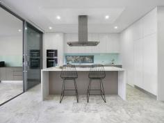  50 Godfrey Street Hurstville Grove NSW 2220  $1,900,000 A statement in premier living, this brand new full brick family home enhances sleek designer interiors with generous proportions. It provides a convenient yet private lifestyle, positioned within moments of local buses and Hurstville South Public School. - Neutral décor with ultra-modern features and stylish fixtures - Immense open plan layout includes living and dining areas - Entertainers' courtyard flows to sun soaked swimming pool - Deluxe kitchen with a butlers' pantry and Miele appliances - Five double bedrooms with built-ins, three include an ensuite - Master suite featuring a walk-in robe and private balcony - Deluxe bathroom offers a rain shower and freestanding bath - Ducted air conditioning and dual entry through Grove Avenue - Secure carspace and double lock-up garage with storage room - Minutes from Westfield Hurstville and Oatley Village/Station... 