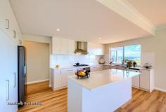  78 Wylie Crescent Middleton Beach WA 6330 $1,100,000 High on the northeastern slope of Mt Clarence, this immaculate home nestled in the prestigious suburb of Middleton Beach sits on a quiet elevated street just minutes from the beach and city centre. The breathtaking views from this brand new home, which are perhaps best taken in from the pale timber wrap around balcony on the upper deck, take in expansive vistas from King George Sound, Gull Rock National Park and the Stirling Ranges. While from the outdoor setting on the deck below, amongst established lawns and manicured landscaping, the new owners will enjoy a Parisian-esque rooftop canopy that stretches out to the north, overlooking the bird sanctuary at Lake Seppings. This elegant and wonderfully designed home incorporates stylish modern materials with classic architectural design. The weatherboard and panel cladding with brick for the undercroft and a Colorbond roof sits seamlessly with the luxury vinyl planks, carpeted bedrooms and stairwell and the glass balustrading surrounding the upper deck. Over two storeys, the home has an open plan living area complete with an entertaining space which could easily accommodate over a dozen guests. The Caesarstone benchtop kitchen which comes complete with dishwasher and an abundance of cabinetry, boasts an Island Bench that flows into entertaining and living spaces including the main deck of the upper balcony, perfect for morning coffees watching the sunrise crest over Breaksea Island. On the upper level adjoining the king-sized master bedroom is an en suite bathroom with His and Hers Caesarstone double vanity, shower, separate toilet and sizeable walk-in robe, while the two family bedrooms, both doubles – have their own Caesarstone bathroom, luxurious bath as well as a separate toilet. On the lower level, via the warm and inviting carpeted staircase, is a family sized games room, a large well presented laundry and an additional space which could be utilised as a home office or a studio/workshop for the work-from-home professional or the creative artisan. The home, on a 696sqm block, features a long undulating white washed driveway that has room for a boat or caravan storage. It also has a pristine double car garage with direct access into the family home. This is ideal for the older demographic as all the living areas are on the one floor This property is a short walk from the world renowned Middleton Beach tourist precinct, the newly upgraded Eyres Park, numerous walking tracks and eateries and is within cycling distance of Albany’s most central and highly sought after primary and high schools. What you need to know: – Executive home ready to move in and enjoy – World-class views from ocean to mountains – Two-storey to maximise outlook – Contemporary design, high-end finish – Construction of weatherboard and panel cladding, brick and Colorbond – Open living space on upper floor – Al fresco area with glass balustrades – Caesarstone Kitchen with dishwasher, abundant cabinetry and Island Bench – Lower-level games room, storage room, studio, laundry and toilet – Master suite with Caesarstone bathroom, separate toilet and walk-in robe – Two double bedrooms – Main bathroom with bath, shower, Caesarstone vanity, separate toilet – Double garage with direct access – Linen room – Within walking distance of beach, eateries and tourist precinct – Easy access to sought after schools and city centre.. 