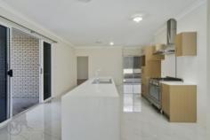  43 Constellation Crescent, BRIDGEMAN DOWNS QLD 4035 |  Madeleine Hicks Real Estate Brisbane Unique Style of Living For An Active Family Life will be easier for you at 43 Constellation Crescent boasting 6 large bedrooms all with their own ensuite and walk-in robes. With so much on offer this oversized family home has loads of storage, multiple living areas downstairs, large living upstairs and plenty of indoor and outdoor entertaining. Ducted air conditioning and solar panels have been installed for the comfort of easy living, giving you more time to relax. Located in the heart of Bridgeman Downs on a 1000sqm block and close proximity to schools, shops, transport and Sunshine Coast highway… Be sure to add this to the top of your inspection list. – Ducted air conditioning – Solar panels – 6 burner gas cooktop – Brand new home – 6 bedrooms all with WIR and En-suites – Oversized living area upstairs – Large laundry with plenty of cupboard space – Loads of storage throughout – Remote gate access – Side assess for caravan – Double garage plus single drive through garage – Master bedroom with freestanding bath tub – Enormous backyard for the kids to play and family pet to run around – Tiled throughout downstairs for easy cleaning – Floorboards in upstairs living areas and bedrooms – High ceilings throughout – Safe and quite location – Pets considered on application AVAILABLE NOW Bedrooms:   6 Bathrooms:   7 