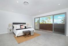  41b Ogilvy Street  Peakhurst NSW 2210 An impeccable full brick brand new duplex home displaying architectural brilliance unparalleled in quality, fusing modern interiors with high standard finishes. Crafted with entertaining in mind, its designed for seamless indoor and outdoor transition. Within close proximity to shops, schools, parks, transport and Hurstville CBD. This luxury residence is complimented by the following features:- * 5 spacious bedrooms plus study area, master enjoying ensuite and walk-in robe, private balconies * Stylish gas kitchen, stone benchtops, ample cupboard space * Formal and informal lounge and dining areas opening to the outdoors * 3 opulent bathrooms, main with separate bath and shower, internal laundry, storage * Extra large undercover entertaining area with alfresco kitchen, low maintenance gardens * Ducted air-conditioning, video security intercom, alarm system * Double remote lock-up garage plus off street parking The clean lines effortlessly balance low maintenance comfort with contemporary luxury. There is no denying the grandeur of this home. FEATURES: Air Conditioning Alarm System Built-In Wardrobes Close To Schools Close To Shops Close To Transport Garden... 