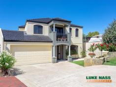  8 Challenger Place Melville WA 6156 $929,000 Stunning, picturesque, breathtaking, alluring, impressive, quality are all words that I would use to describe this gorgeous four bedroom two bathroom imposing family home. DON’T TAKE MY WORD FOR IT, COME AND SEE FOR YOURSELF! From the minute you enter, this faultless home will captivate you with its show home presentation and quality fixtures and fittings. You will not want to leave! Add to this the prime location, sought after street, walking distance to the local shops, Blend coffee shop and proximity to the schools, you now have a property that is simply hard to beat. Upon entry, you are greeted with the spacious home theatre with double french doors, which is opposite the shoppers entry to the double remote controlled garage. The laundry, separate WC/ powder room and staircase are also accessed from the front foyer. The hub of the home is at the rear of the property. Here you will find The jaw dropping gourmet kitchen, dining, family and games room. The kitchen is a chef’s delight, with an abundance of cupboards, granite bench tops, six burner gas cooking hob, dishwasher, feature lighting and a walk in pantry/scullery. The kitchen overlooks the large meals area, spacious family room, and the large double door games room, which accesses the backyard through by-folding doors. Fabulous for a family that loves to entertain. Upstairs you will find the master suite, three double sized guest bedrooms with double built in robes, a relaxation/reading nook, the guest bathroom, separate second WC, double door linen cupboard, an extra walk in linen cupboard and access to the balcony. The master suite is impressive and spacious, with views to the city, a generous ensuite and large walk in robe. The backyard is delightful and low maintenance, with an under cover entertaining area, a casual seating area opposite the spa with artificial grass, a vegetable patch at the rear and feature walls. Other amazing features of this property include city views from the front of the property, solid Tasmanian Oak floors, three WC’s, split system heating and cooling, gas bayonets, gas infinity hot water system, front balcony, alarm system, intercom, reticulation, plus much much more. Rest assured, you will not have to compromise on anything here. View by appointment or look out for the advertised home opens. 